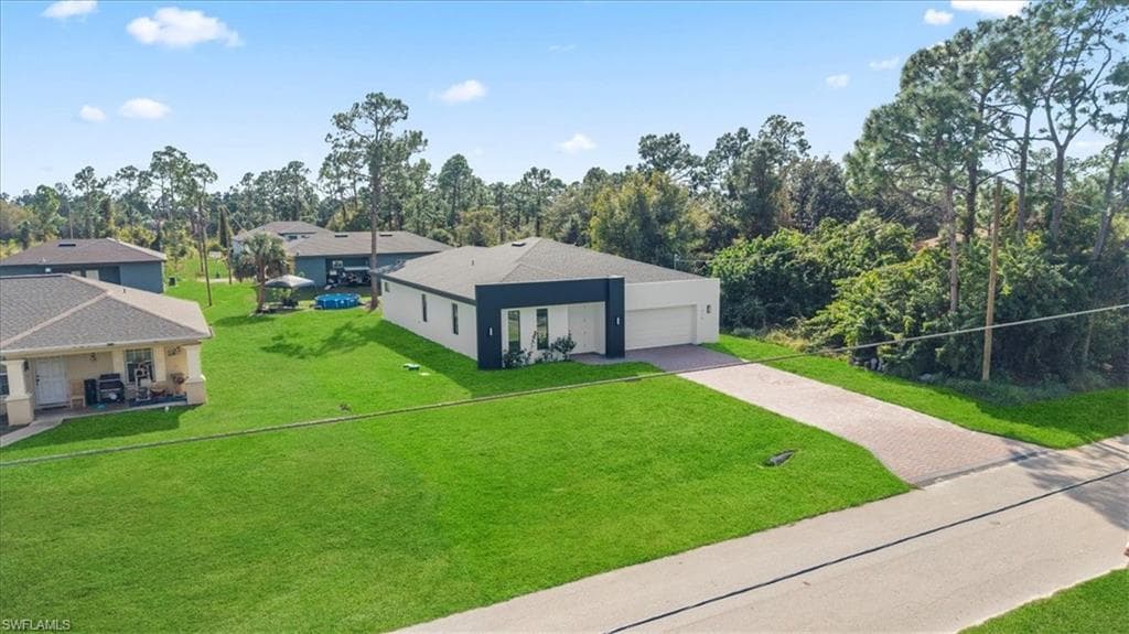 1218 Eclat ST E, LEHIGH ACRES FL 33974-35
