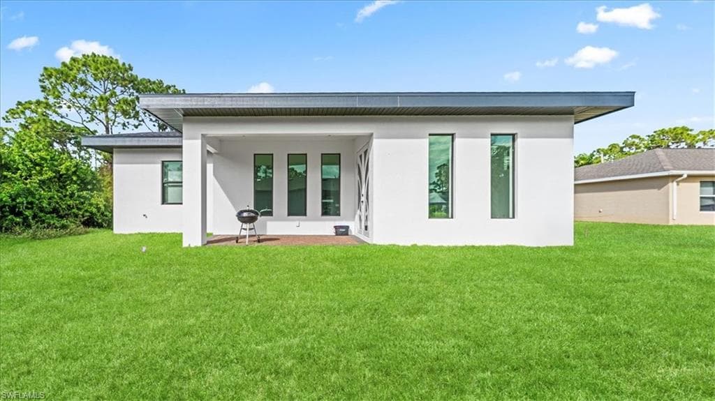 1218 Eclat ST E, LEHIGH ACRES FL 33974-4
