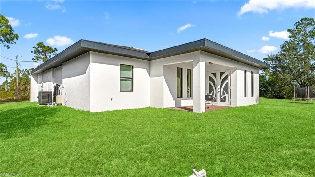 1218 Eclat ST E, LEHIGH ACRES FL 33974-3
