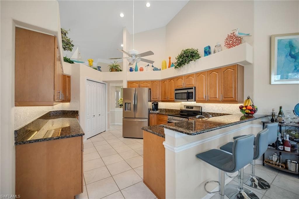 7809 Naples Heritage DR, NAPLES FL 34112-9