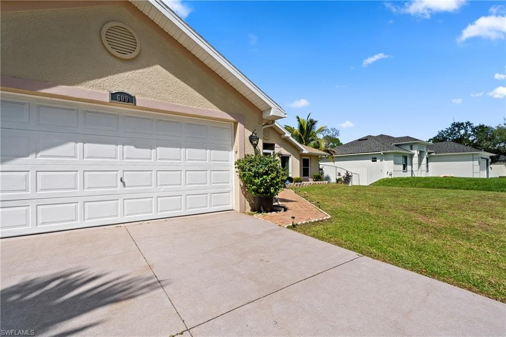 609 Gerald AVE, LEHIGH ACRES FL 33936-5