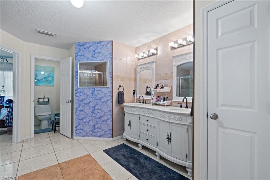 609 Gerald AVE, LEHIGH ACRES FL 33936-42