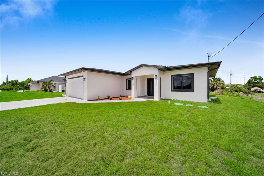 714 Euston AVE S, LEHIGH ACRES FL 33974-3