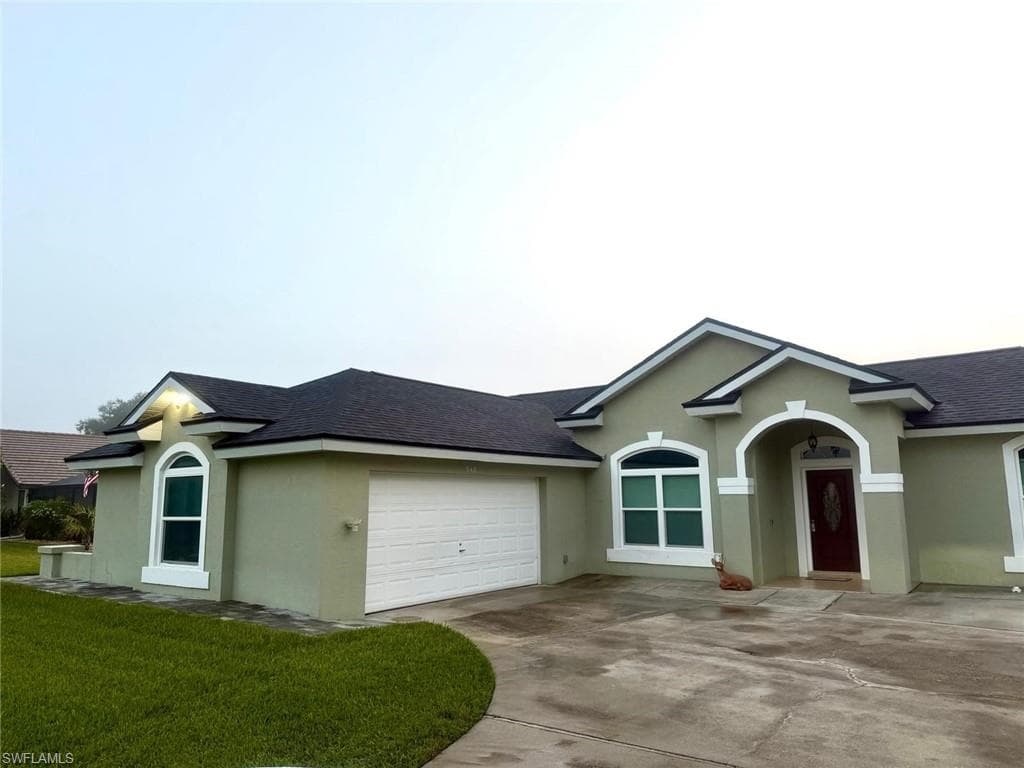 545 Whispering Wind BEND, LEHIGH ACRES FL 33974-1