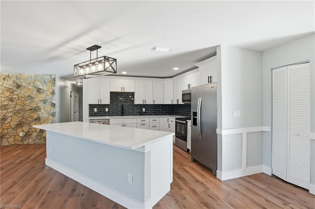 113 E Lake DR, LEHIGH ACRES FL 33936-16