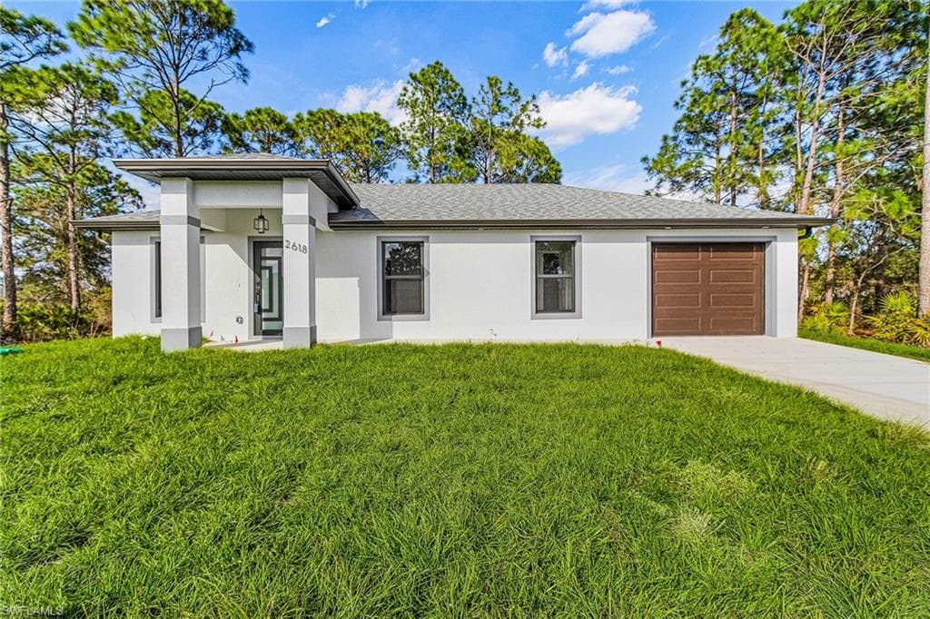 2618 41 ST W, LEHIGH ACRES FL 33971-1