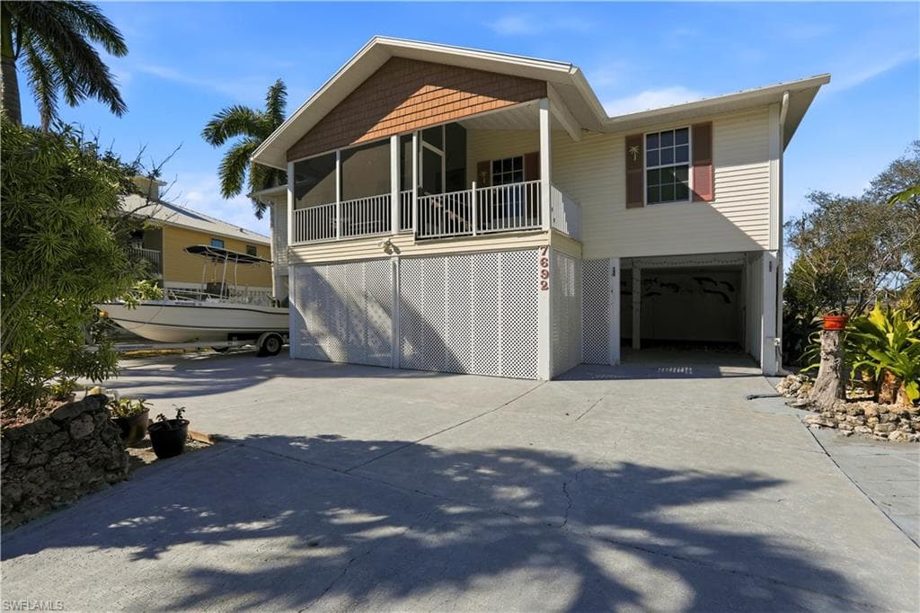 7692 Myrsine CIR, BOKEELIA FL 33922-1