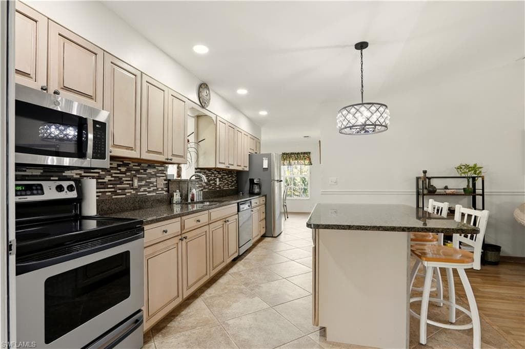 7692 Myrsine CIR, BOKEELIA FL 33922-8