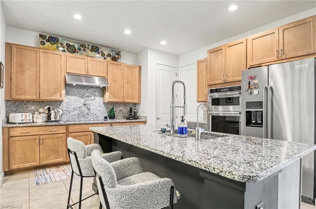 13045 Pembroke DR, NAPLES FL 34105-3