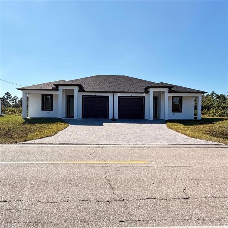 209-211 W 12th ST, LEHIGH ACRES FL 33972-1