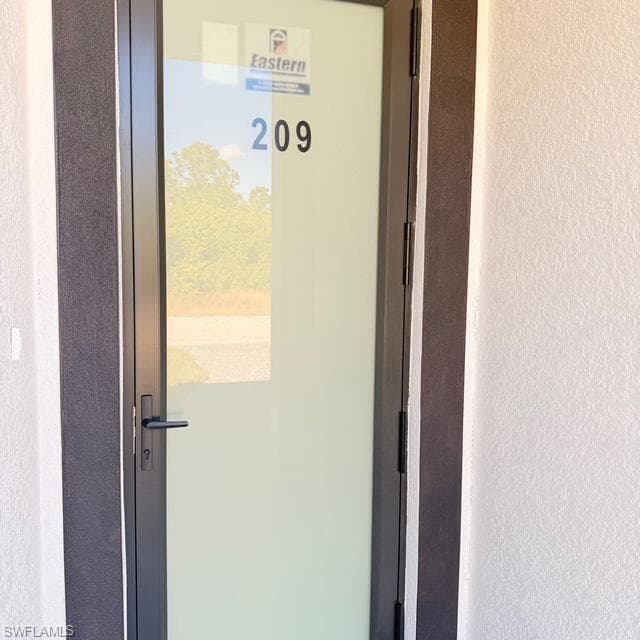 209-211 W 12th ST, LEHIGH ACRES FL 33972-4
