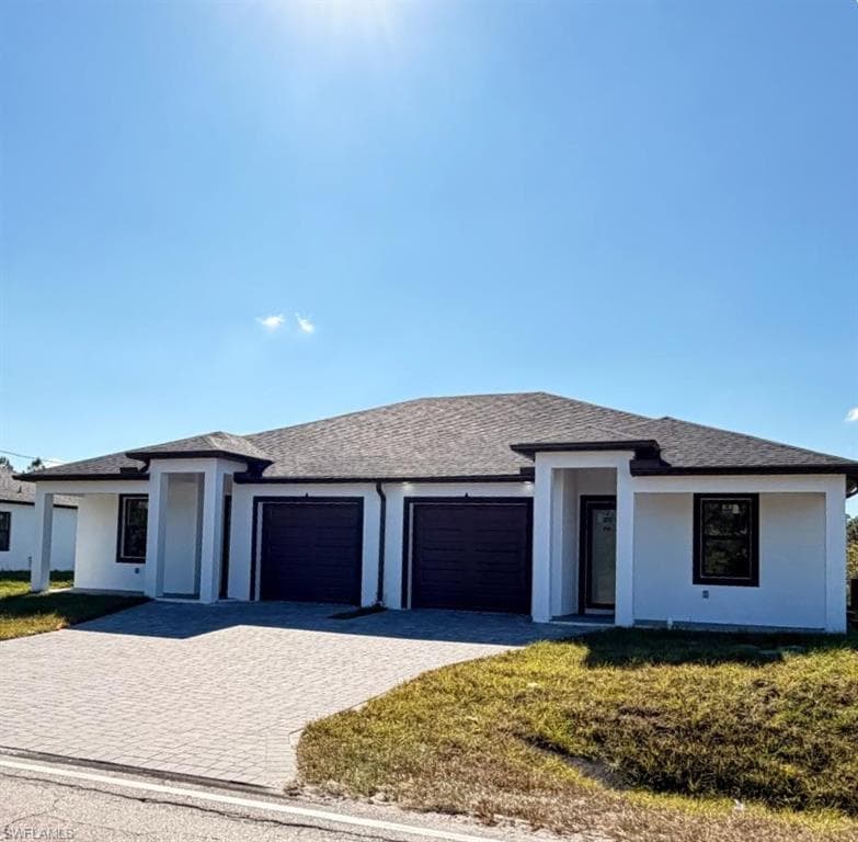 213-215 W 12th ST, LEHIGH ACRES FL 33972-1