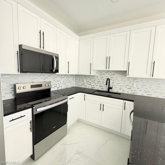 213-215 W 12th ST, LEHIGH ACRES FL 33972-8