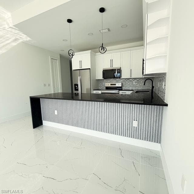 213-215 W 12th ST, LEHIGH ACRES FL 33972-9