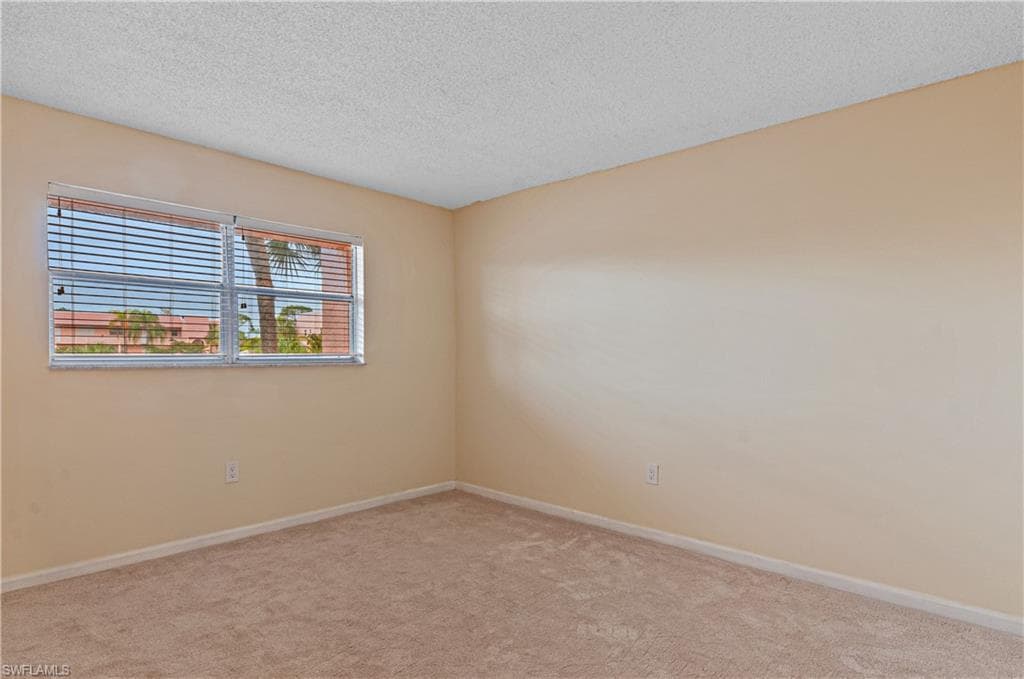 225 TURTLE LAKE CT # 209, NAPLES FL 34105-6