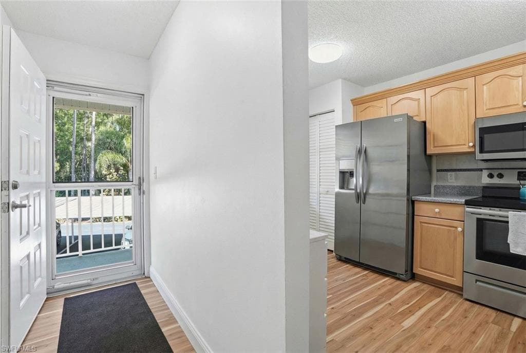 5654 WOODMERE LAKE CIR # C203, NAPLES FL 34112-9