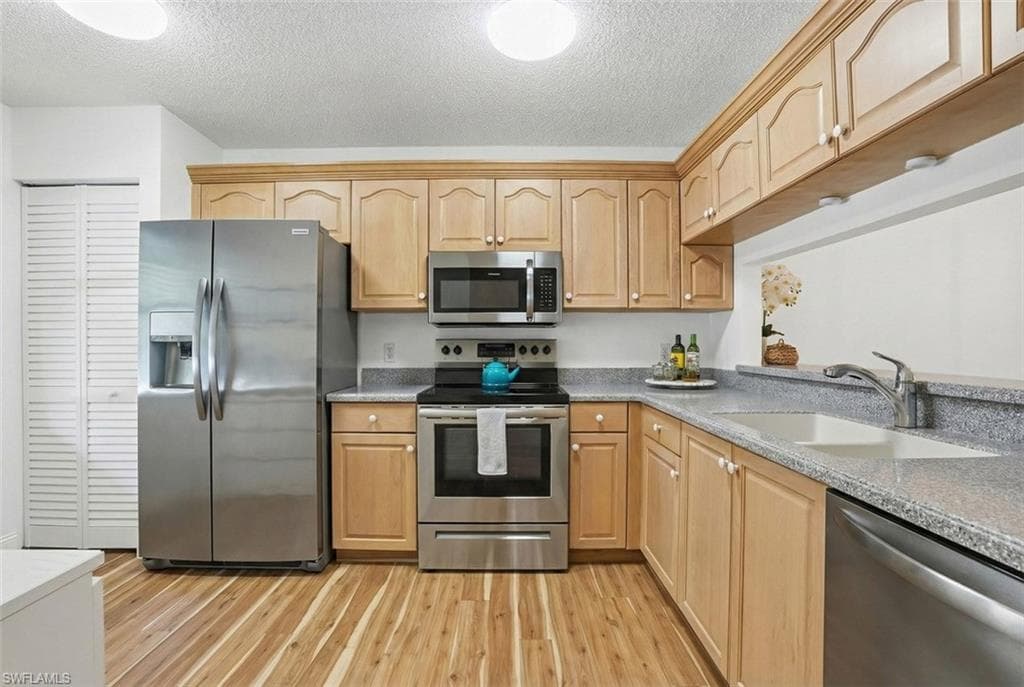 5654 WOODMERE LAKE CIR # C203, NAPLES FL 34112-7