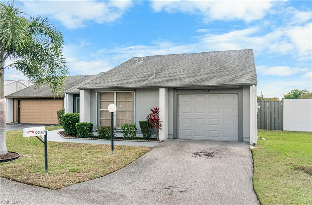 9777 Oakcrest CT, LEHIGH ACRES FL 33936-37