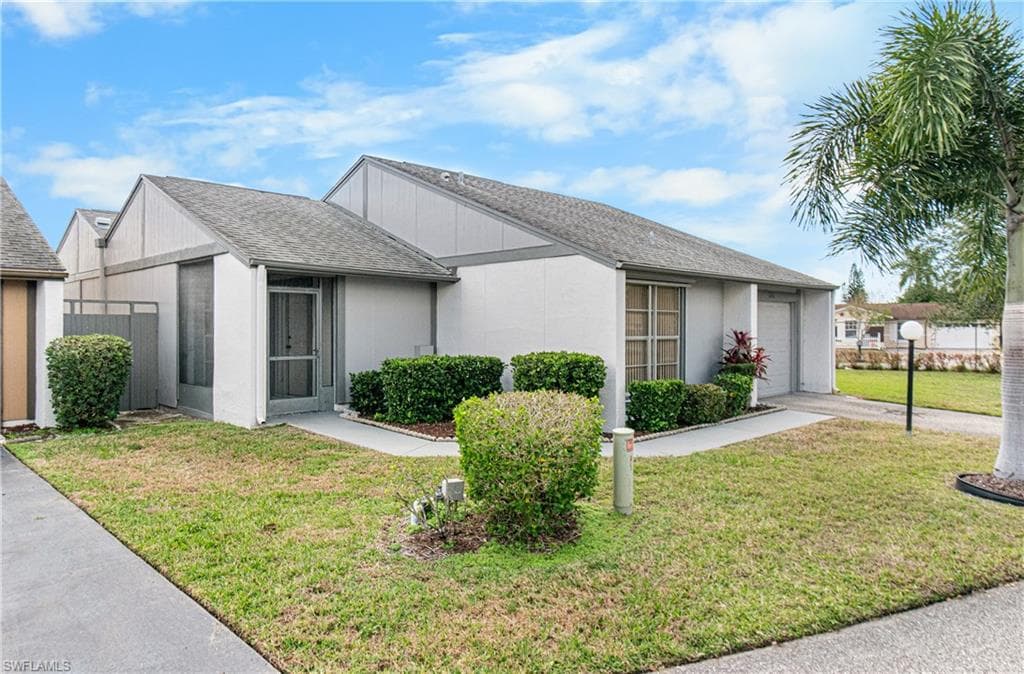 9777 Oakcrest CT, LEHIGH ACRES FL 33936-36