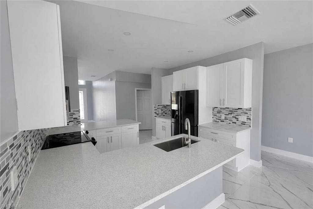 52 Paula AVE S, LEHIGH ACRES FL 33976-3