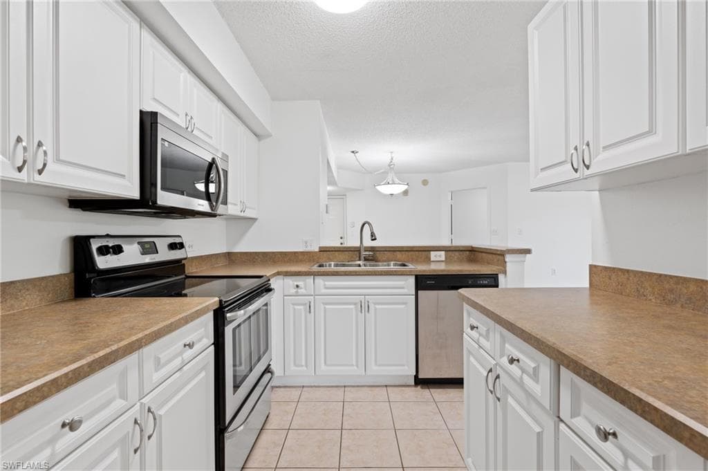 8940 Colonnades CT E 734-12