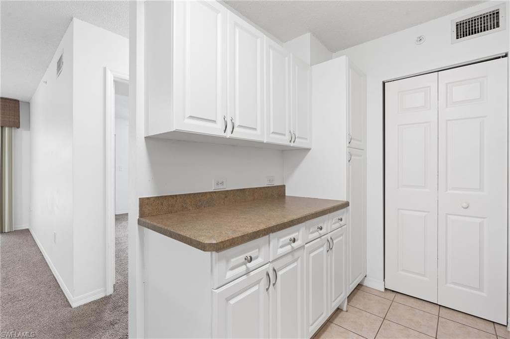 8940 Colonnades CT E 734-11