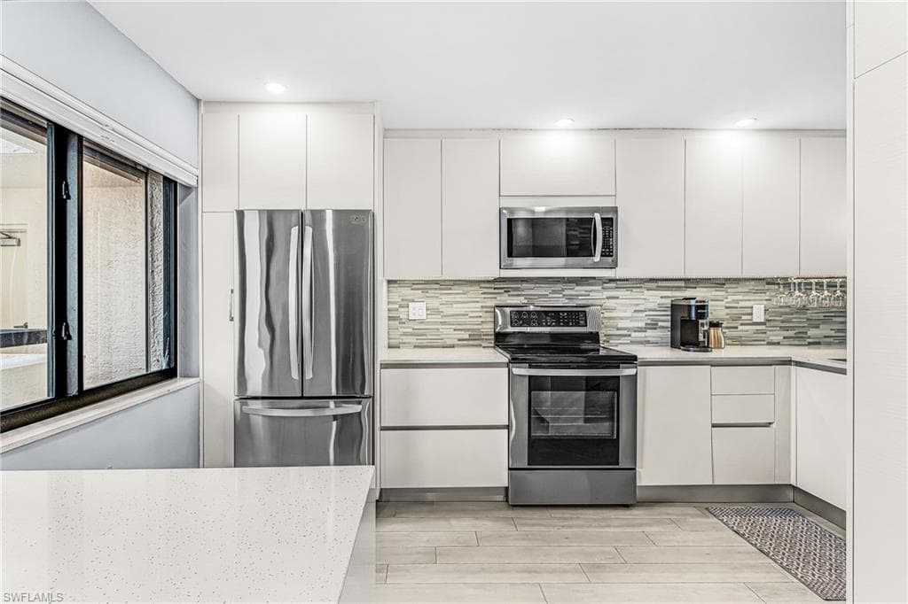 8402 Estero BLVD 704-3