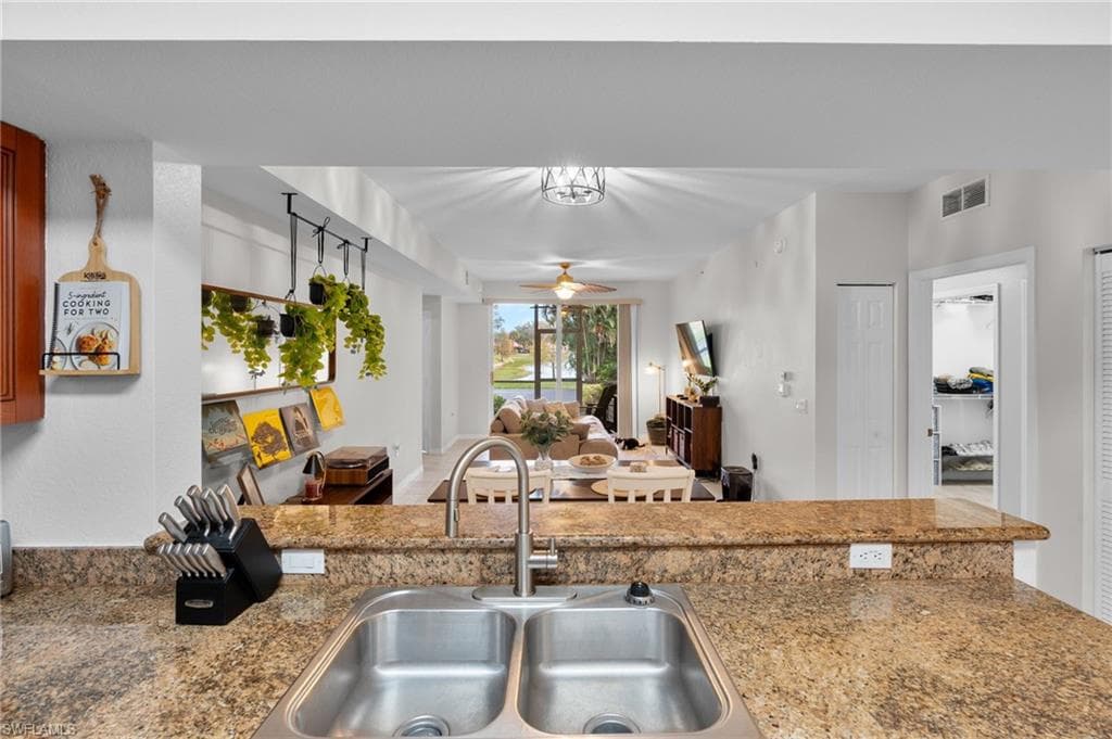 20150 ESTERO GARDENS CIR 102-4