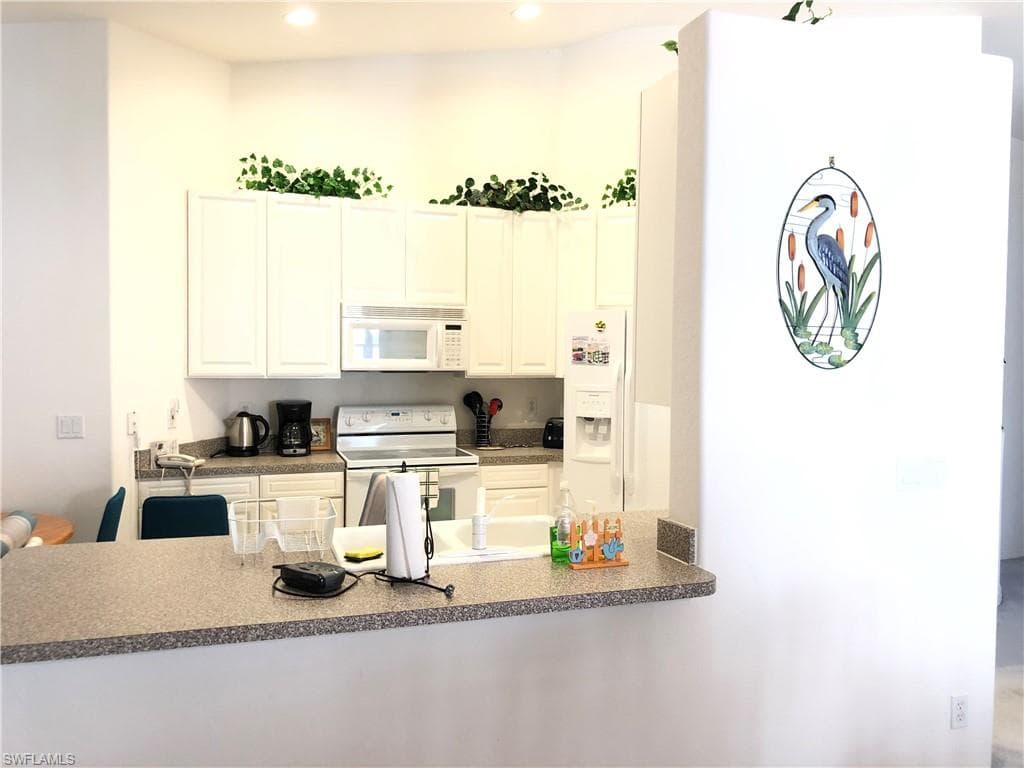 6854 STERLING GREENS DR 201-5