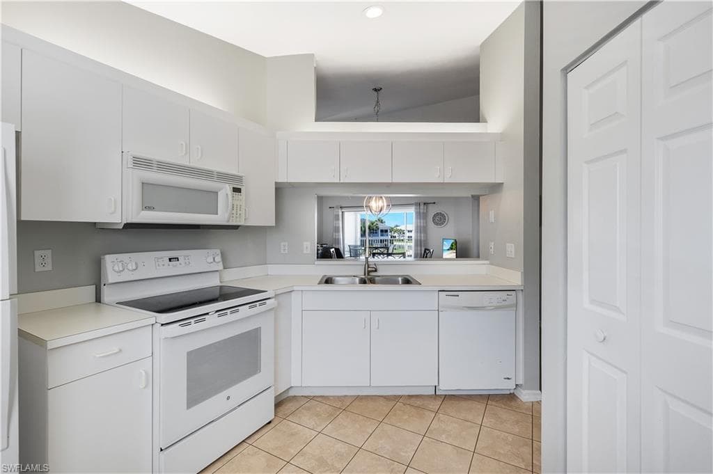 12131 Summergate CIR 203-13