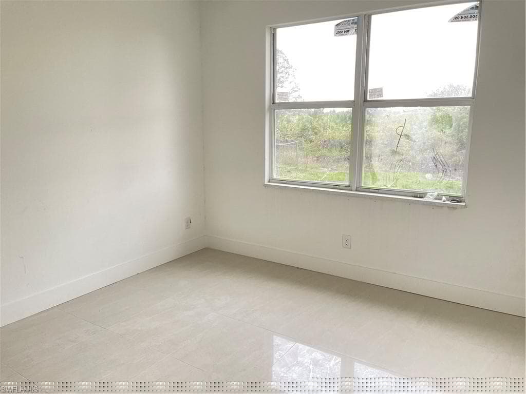 856 William Denver St, Lehigh Acres, FL 33974-8