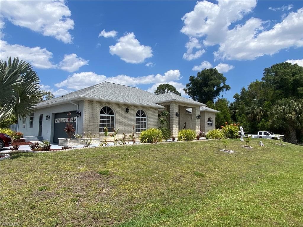 1802 Golfside Village Dr, Lehigh Acres, FL 33936-4
