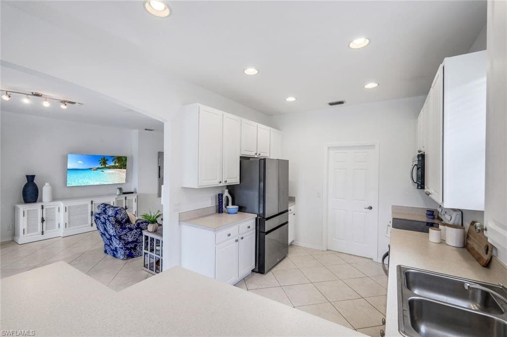 5576 Lago Villaggio Way, Naples, FL 34104-13