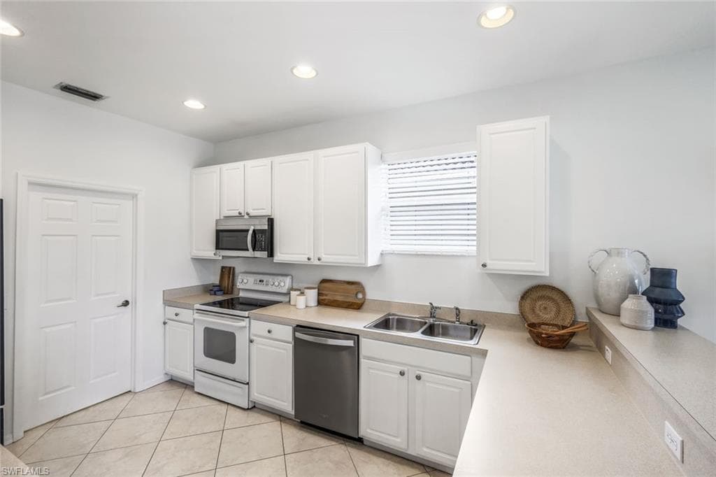 5576 Lago Villaggio Way, Naples, FL 34104-14