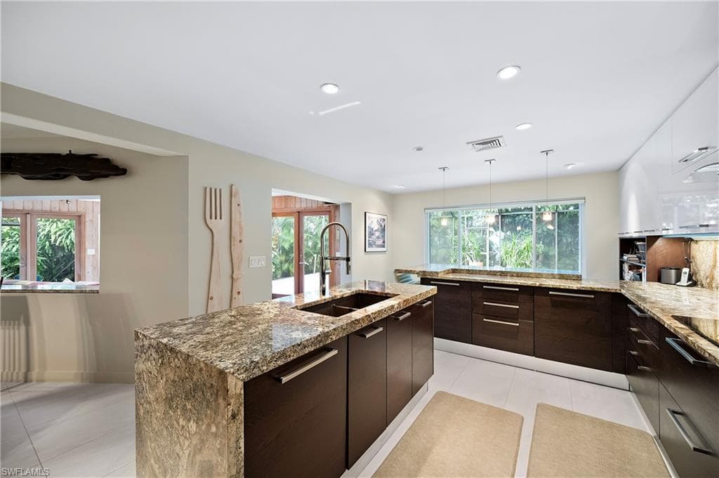 1303 Wahoo Ct, Naples, FL 34102-27
