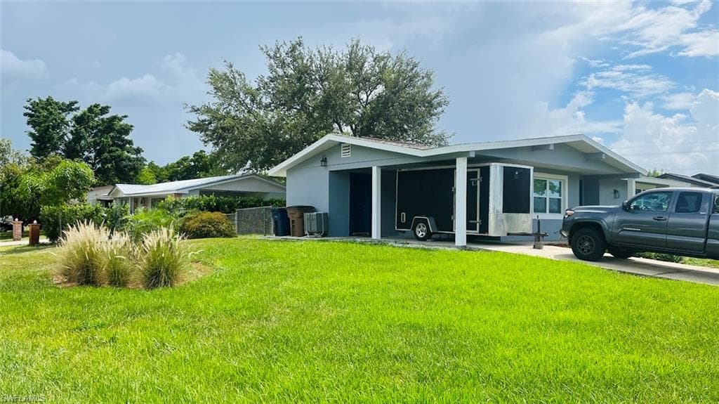 4 Palm Blvd, Lehigh Acres, FL 33936-2