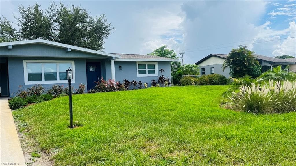 4 Palm Blvd, Lehigh Acres, FL 33936-3