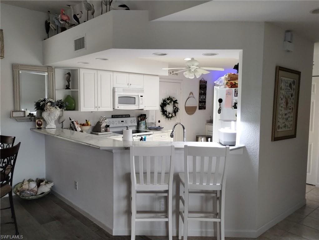 25068 Peacock Ln 102, Naples, FL 34114-9