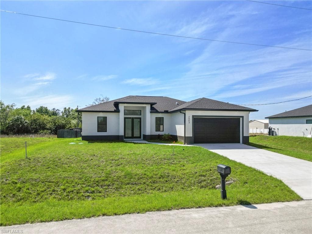 2003 Curry Ave N, Lehigh Acres, FL 33971-3