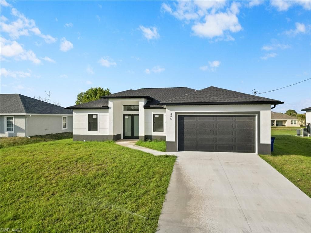 445 Paddock St, Lehigh Acres, FL 33974-1