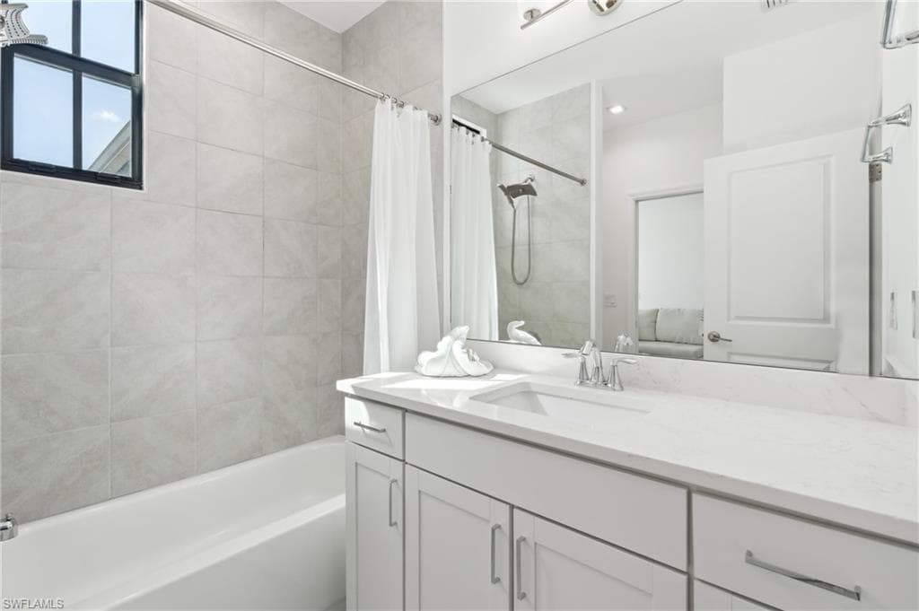 7566 Rockefeller Dr, Naples, FL 34119-20