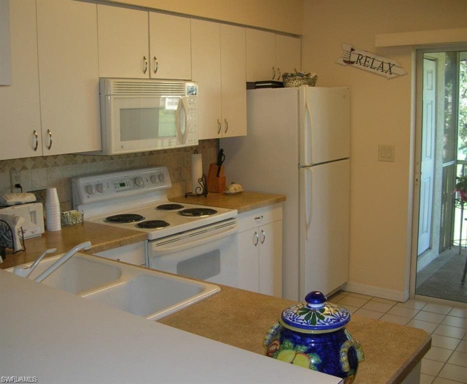 287 Quail Forest Blvd 215, Naples, FL 34105-5