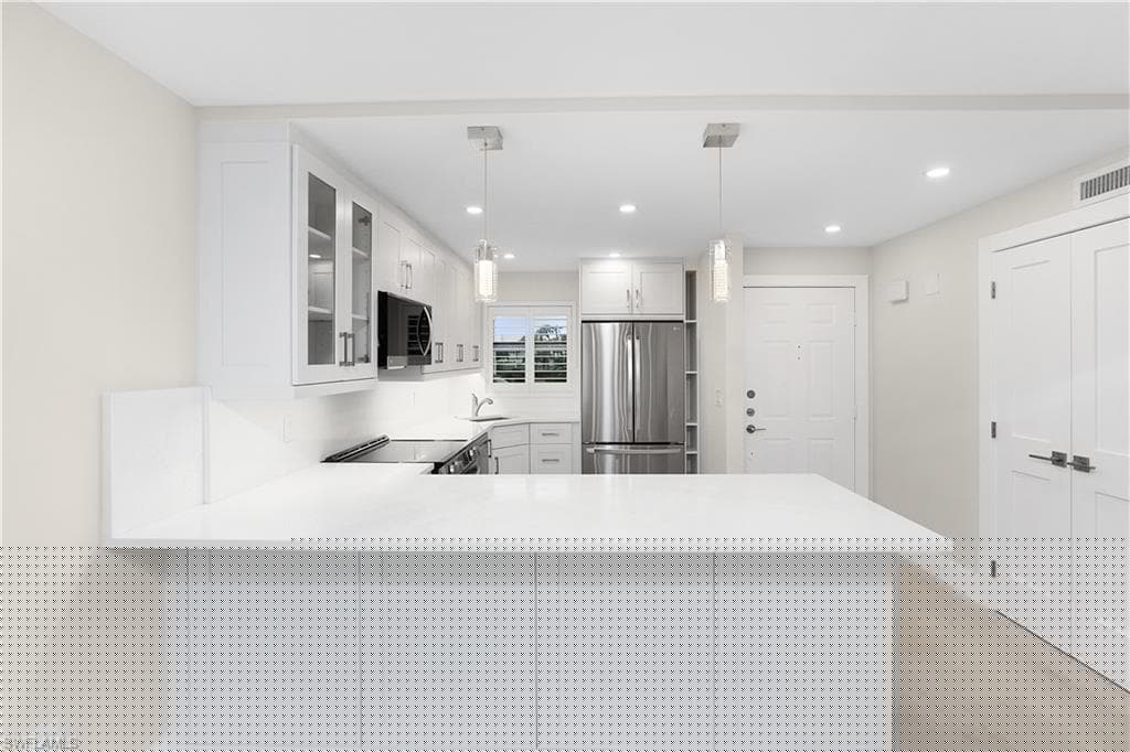 57 High Point Cir W 104, Naples, FL 34103-9