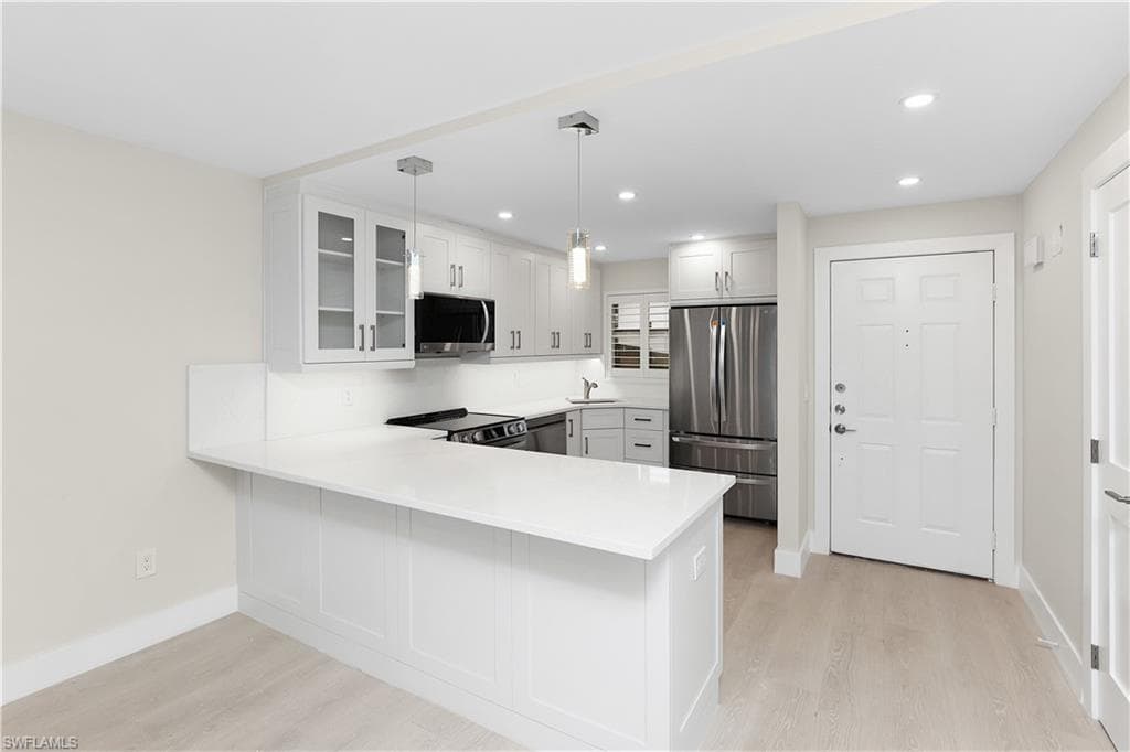 57 High Point Cir W 104, Naples, FL 34103-11