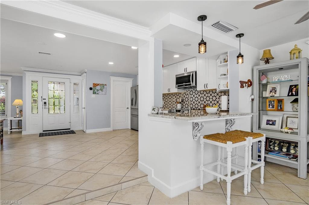 1072 Wisconsin Dr, Naples, FL 34103-13
