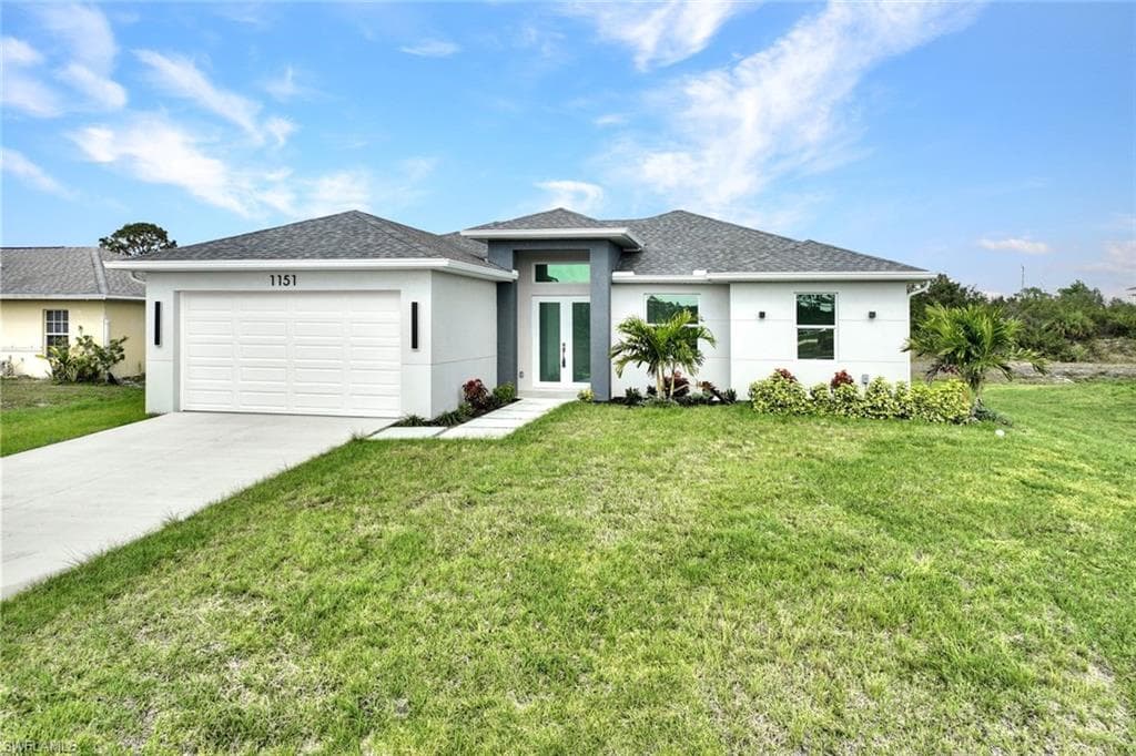 1153 Ermine St E, Lehigh Acres, FL 33974-2