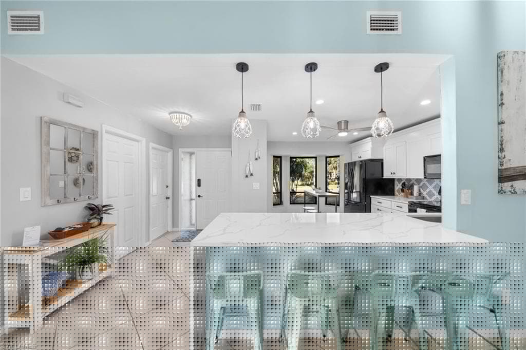 821 15th St SW, Naples, FL 34117-7