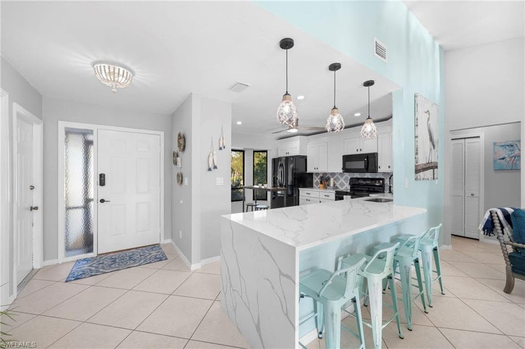 821 15th St SW, Naples, FL 34117-8