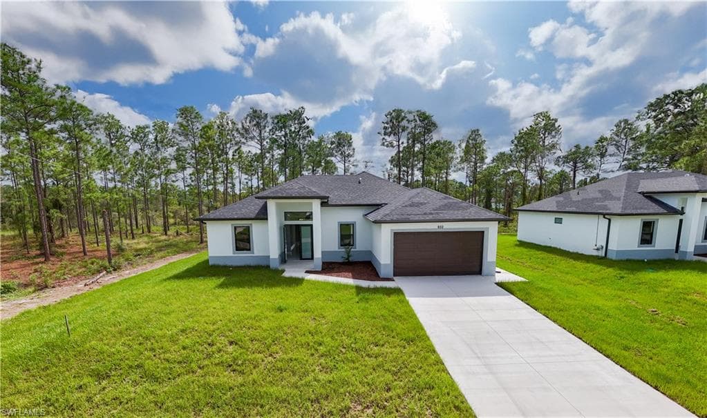 932 Maddock St E, Lehigh Acres, FL 33974-1