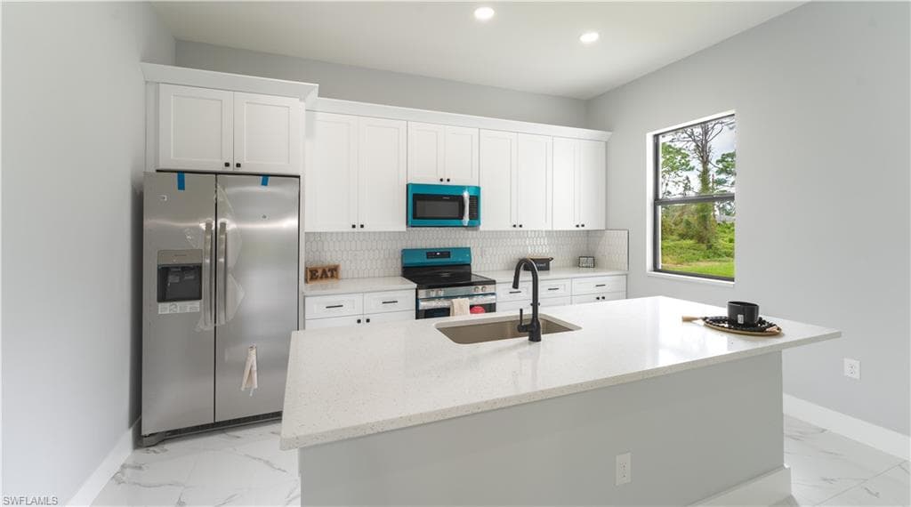 932 Maddock St E, Lehigh Acres, FL 33974-2